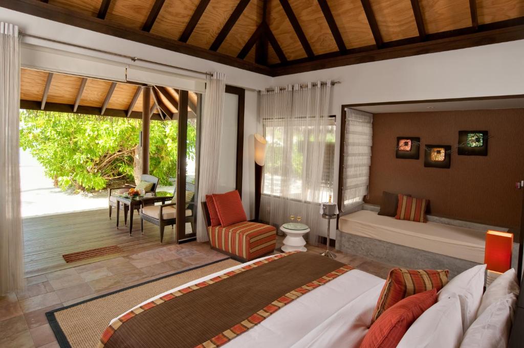 Postel nebo postele na pokoji v ubytování Velassaru Maldives
