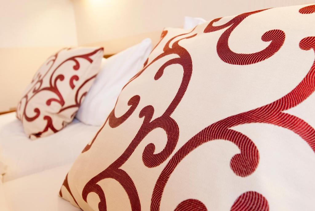 Postel nebo postele na pokoji v ubytování Hotel Excelsior