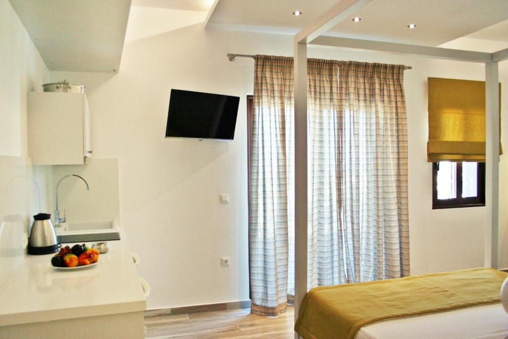 A television and/or entertainment centre at Lindos Beauty