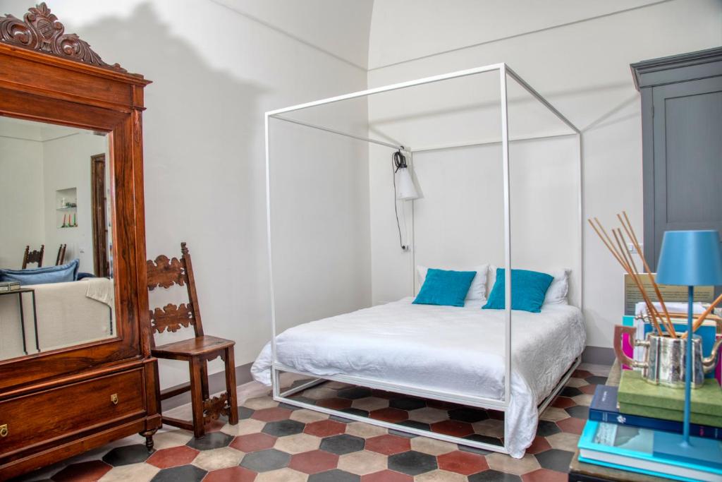 Łóżko lub łóżka w pokoju w obiekcie Casa Cantasol - Capri