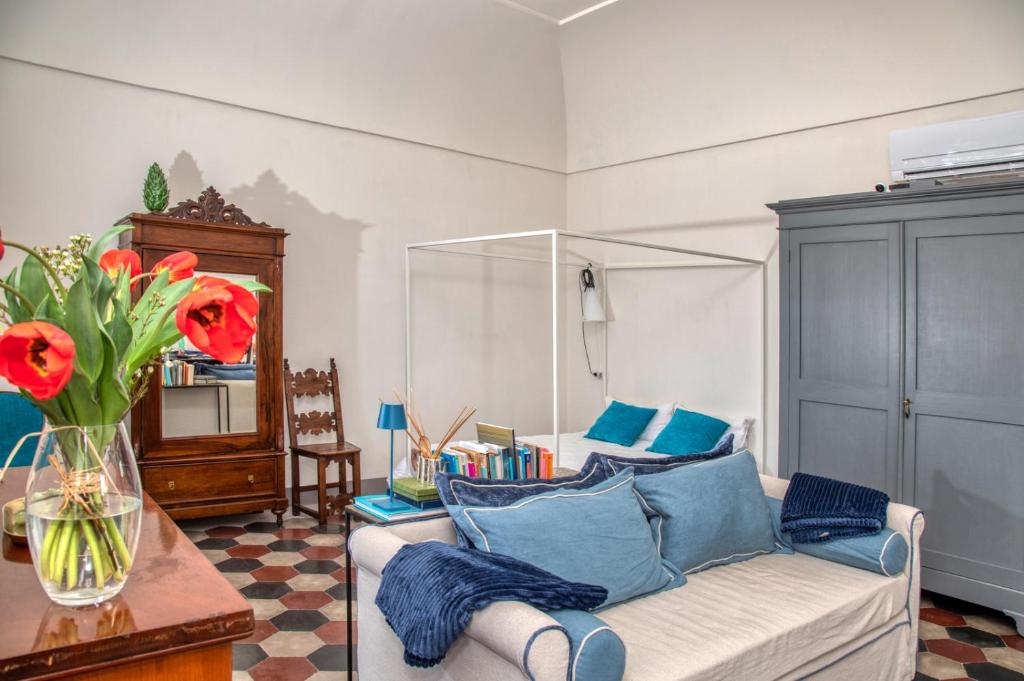Łóżko lub łóżka w pokoju w obiekcie Casa Cantasol - Capri