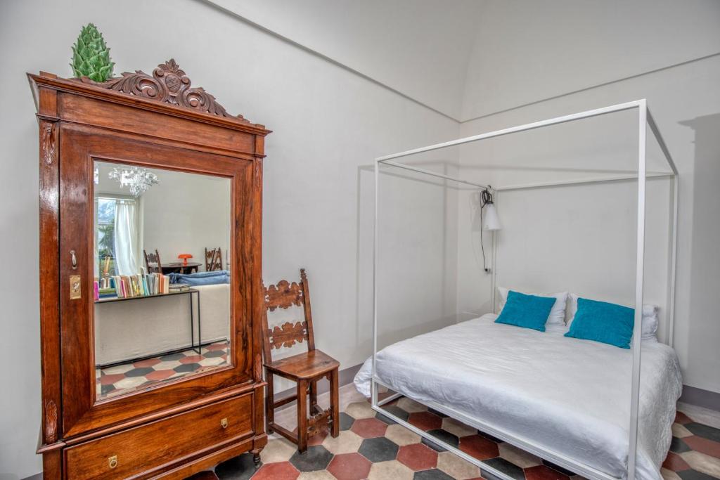 Łóżko lub łóżka w pokoju w obiekcie Casa Cantasol - Capri