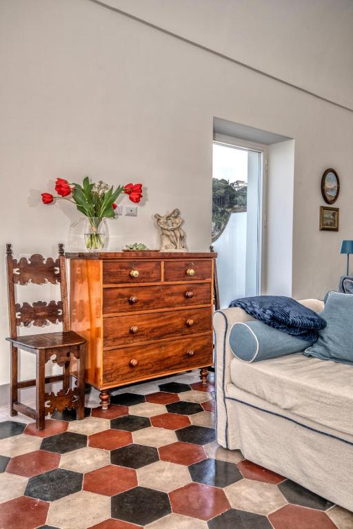 Łóżko lub łóżka w pokoju w obiekcie Casa Cantasol - Capri