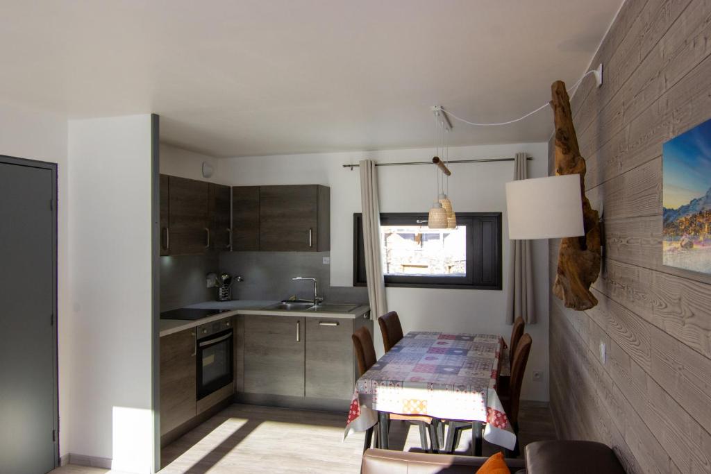 Kuchyň nebo kuchyňský kout v ubytování Olympic Appartements VTI