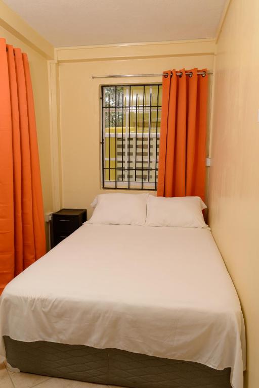 Postel nebo postele na pokoji v ubytování Sephina Villa St Lucia Island Dream Holidays