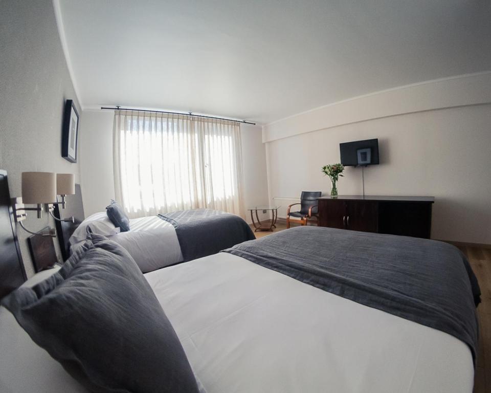 Postel nebo postele na pokoji v ubytování Hotel RP