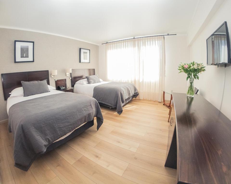 Postel nebo postele na pokoji v ubytování Hotel RP