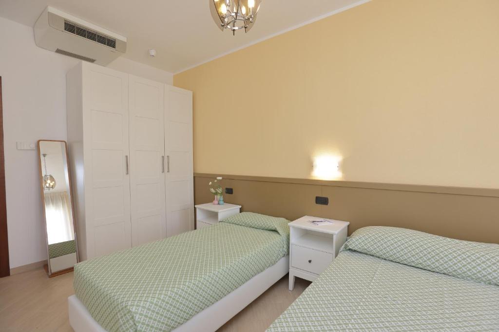 Voodi või voodid majutusasutuse Residence Hotel Kriss toas