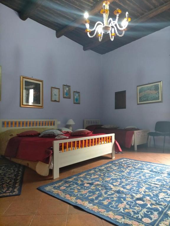 Posteľ alebo postele v izbe v ubytovaní Casa vacanza zia Ersilia