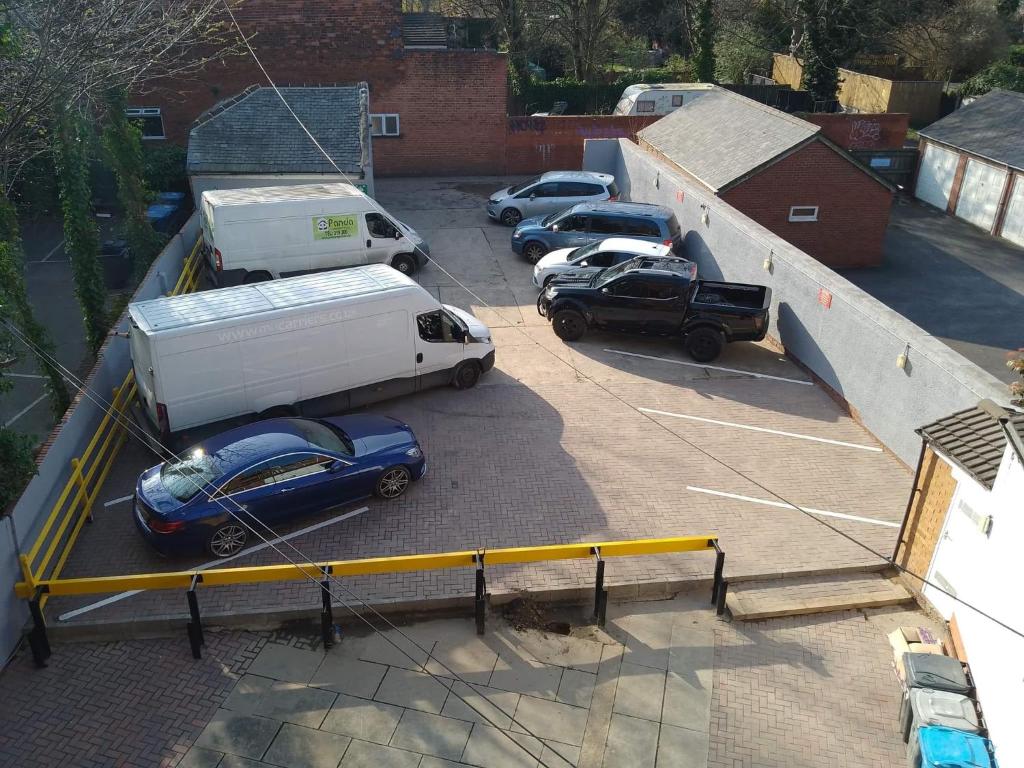 a group of cars parked in a parking lot at Park View in Hull