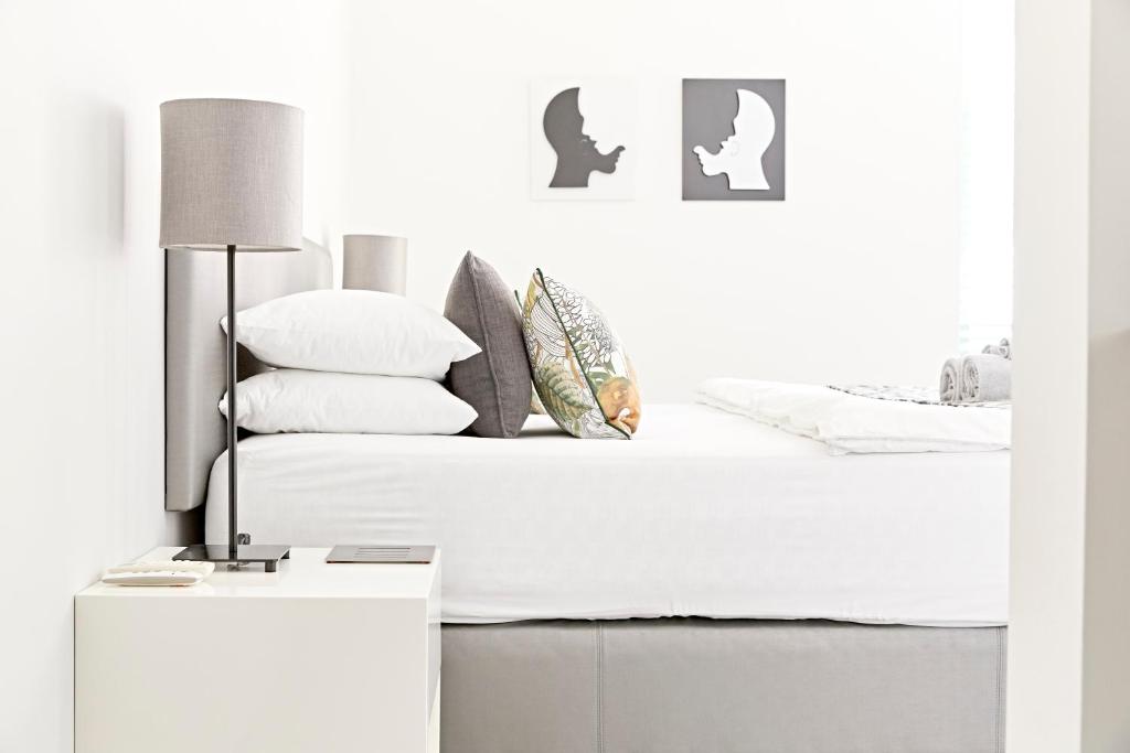 Postel nebo postele na pokoji v ubytování Bayview Boutique Guesthouse