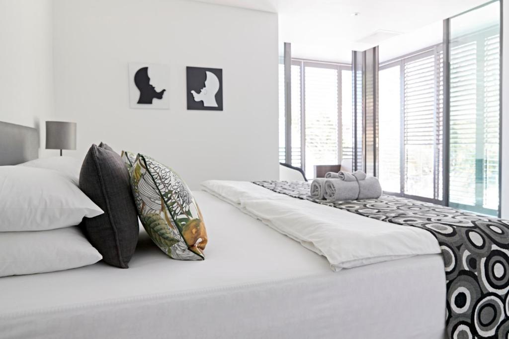 Postel nebo postele na pokoji v ubytování Bayview Boutique Guesthouse