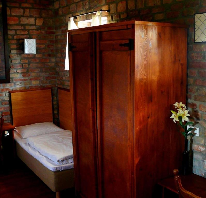 Postel nebo postele na pokoji v ubytování Trzy Dęby