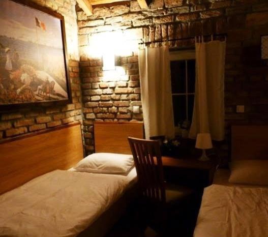 Postel nebo postele na pokoji v ubytování Trzy Dęby