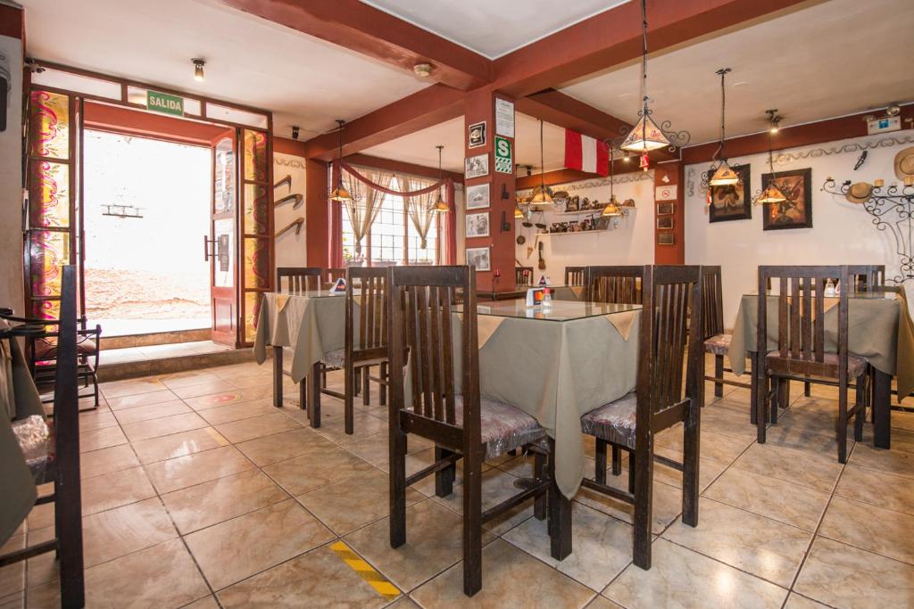 Um restaurante ou outro lugar para comer em Ayenda Posada Inn