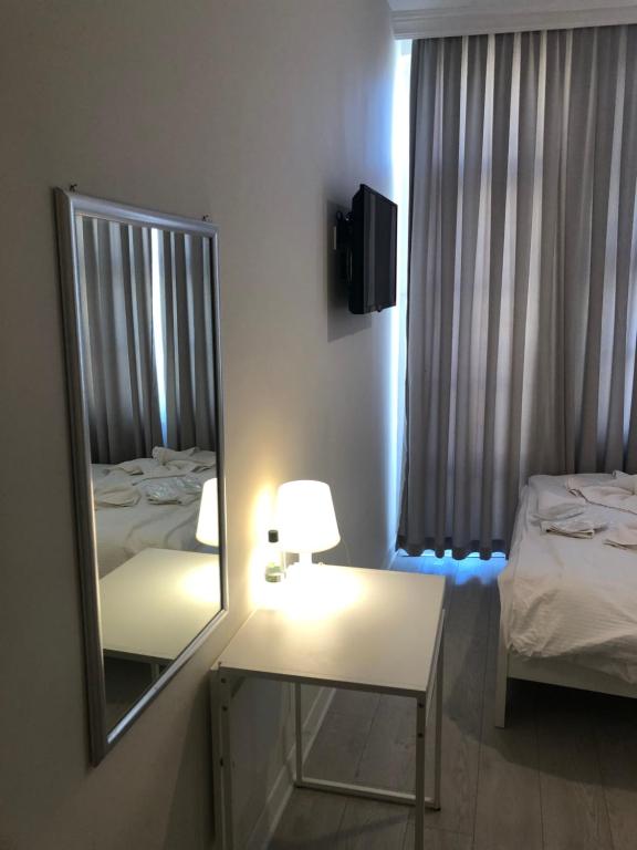 Postel nebo postele na pokoji v ubytování ATICI HOTEL
