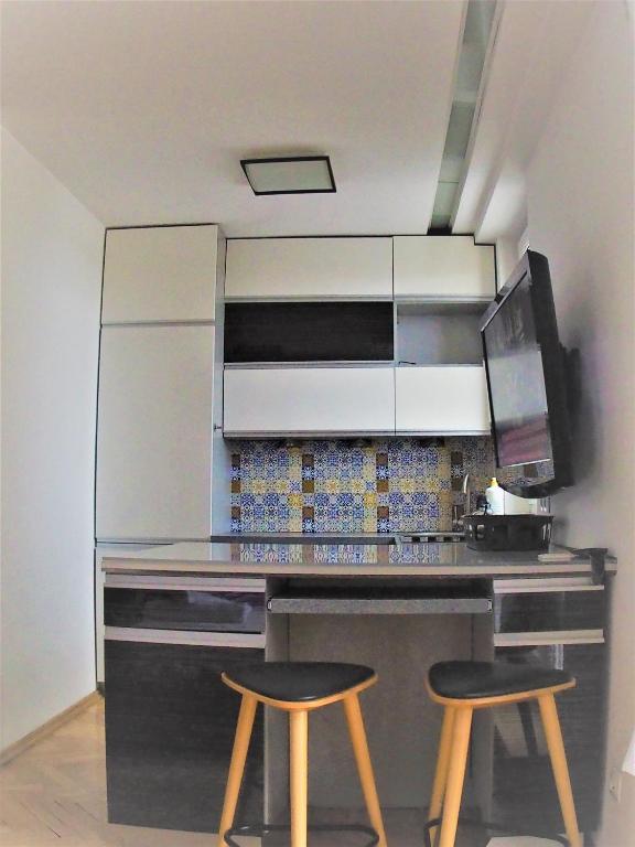 Kuchyňa alebo kuchynka v ubytovaní Ambassador Apartament