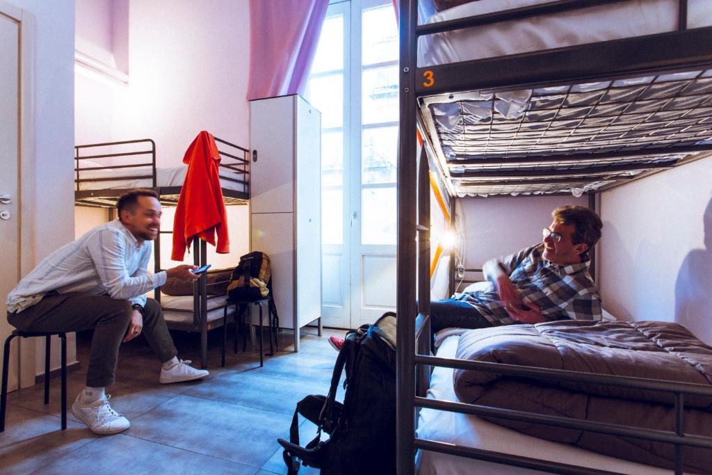 Postel nebo postele na pokoji v ubytování LoL Hostel Siracusa