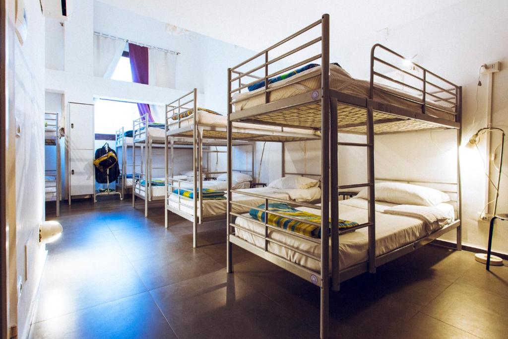 Postel nebo postele na pokoji v ubytování LoL Hostel Siracusa