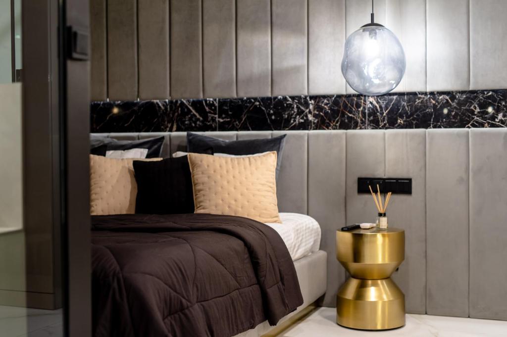 Posteľ alebo postele v izbe v ubytovaní Super-Apartamenty VIP Jacuzzi II