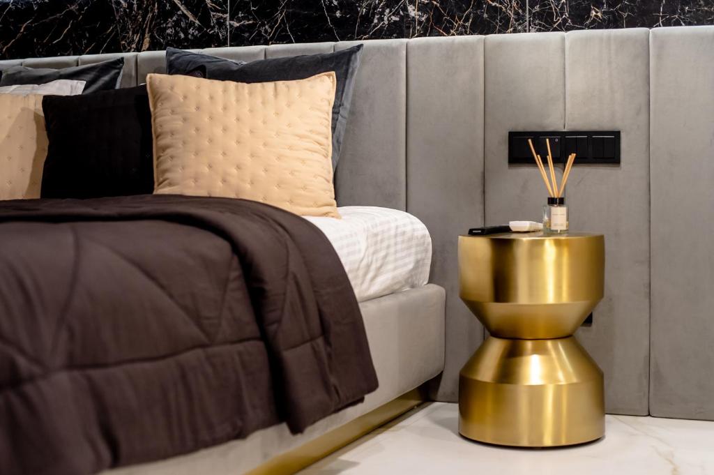 Posteľ alebo postele v izbe v ubytovaní Super-Apartamenty VIP Jacuzzi II