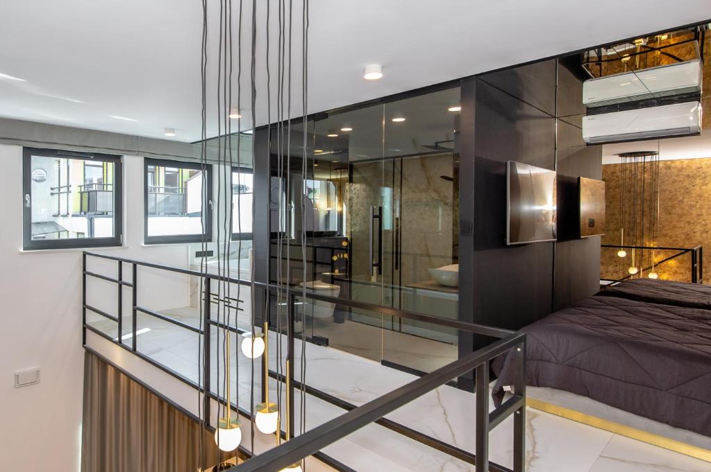 Posteľ alebo postele v izbe v ubytovaní Super-Apartamenty VIP Jacuzzi II