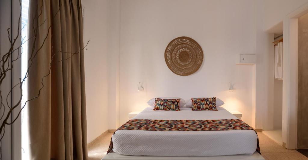Postel nebo postele na pokoji v ubytování Cal Day Rooms Santorini
