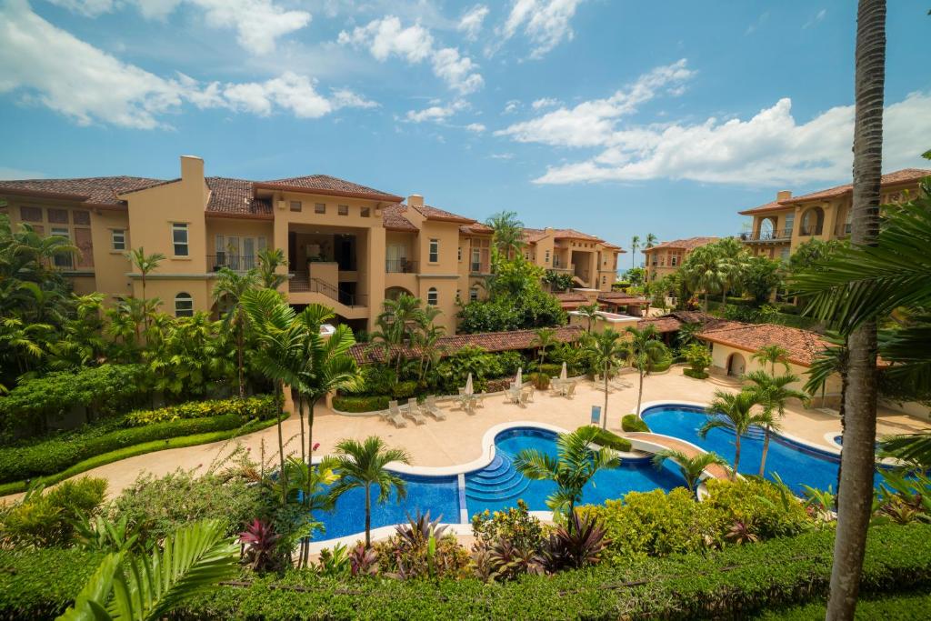 an aerial view of a resort with a swimming pool at 3 bedroom Bella Vista 2D close to pool by Stay in CR in Herradura