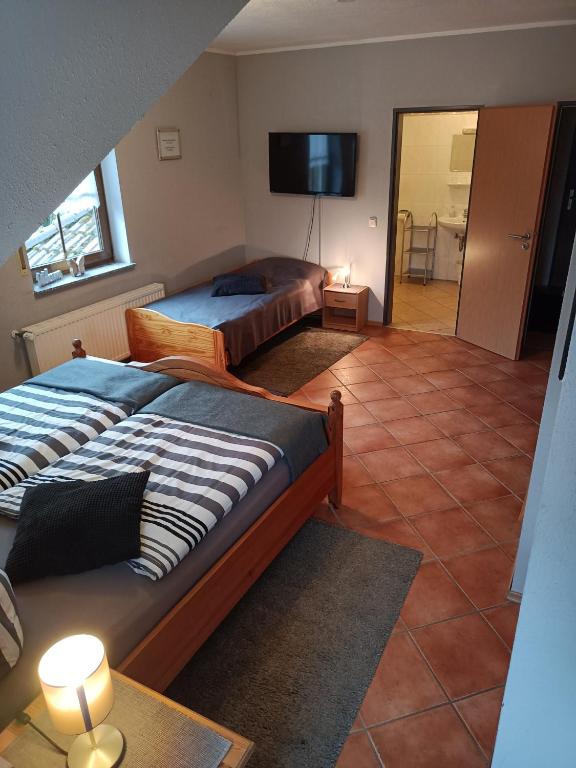 Postel nebo postele na pokoji v ubytování Landhaus am Brubbel