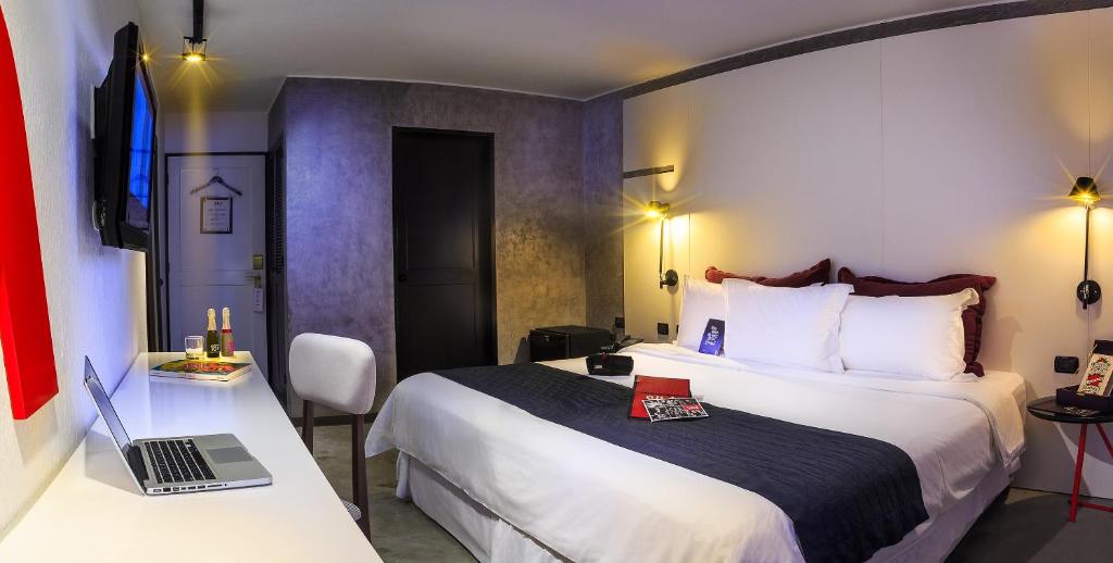 Ένα ή περισσότερα κρεβάτια σε δωμάτιο στο BTH Hotel – Boutique Concept