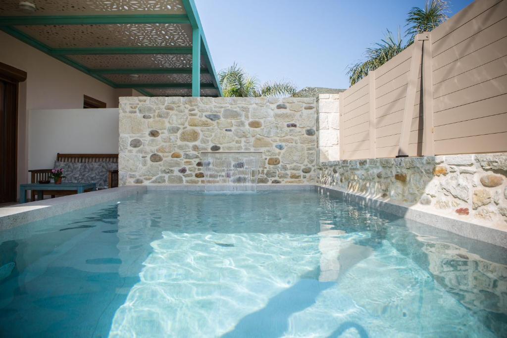 The swimming pool at or close to Arodamos Studios Apartments