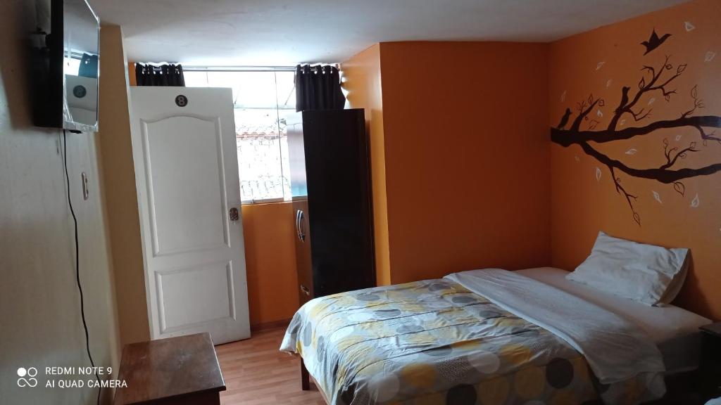 Voodi või voodid majutusasutuse Nature Home Cusco toas