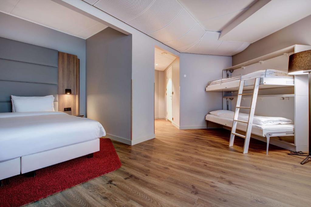 Postel nebo postele na pokoji v ubytování Radisson Blu Hotel Nydalen, Oslo