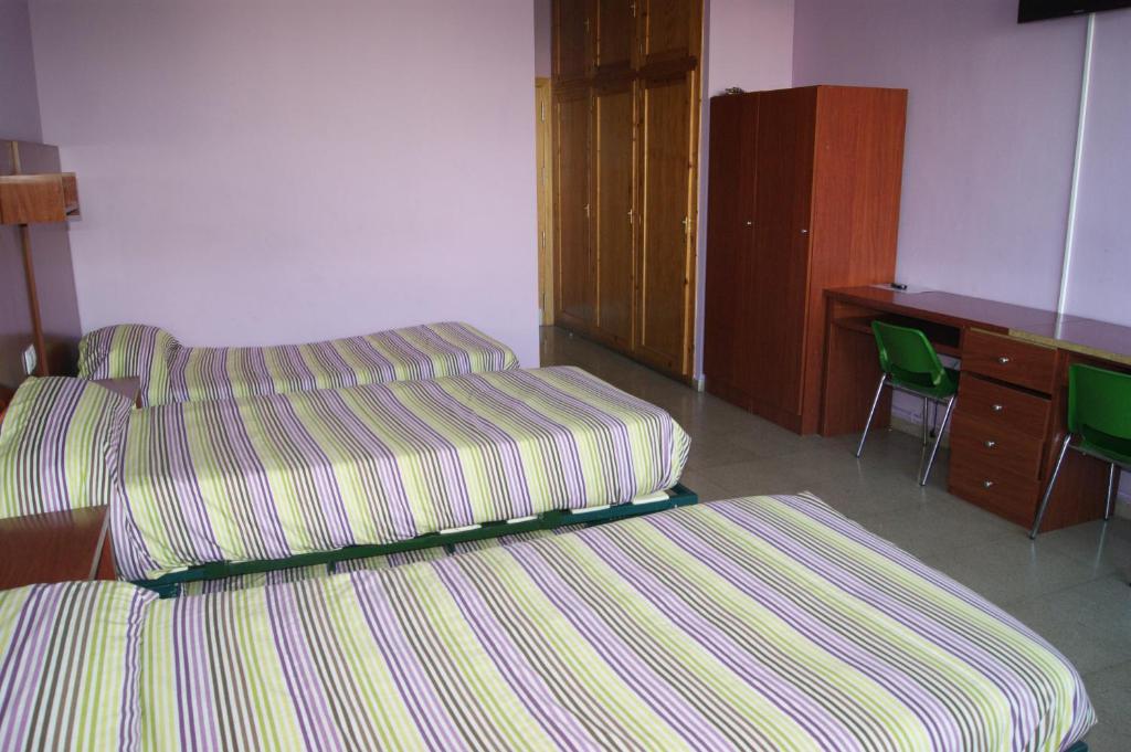 Voodi või voodid majutusasutuse Residencia Albergue Jaca toas