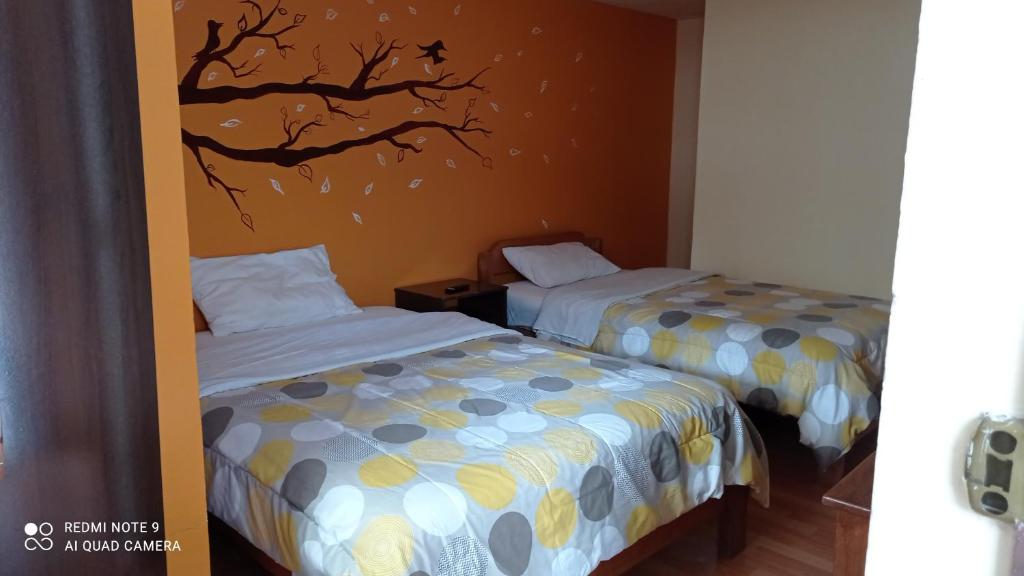 Voodi või voodid majutusasutuse Nature Home Cusco toas