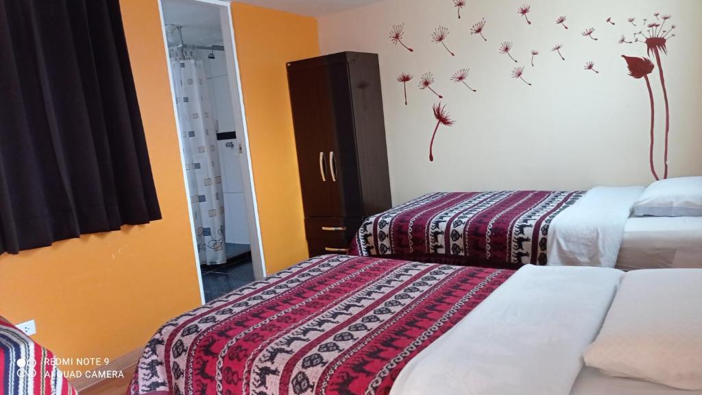 Voodi või voodid majutusasutuse Nature Home Cusco toas
