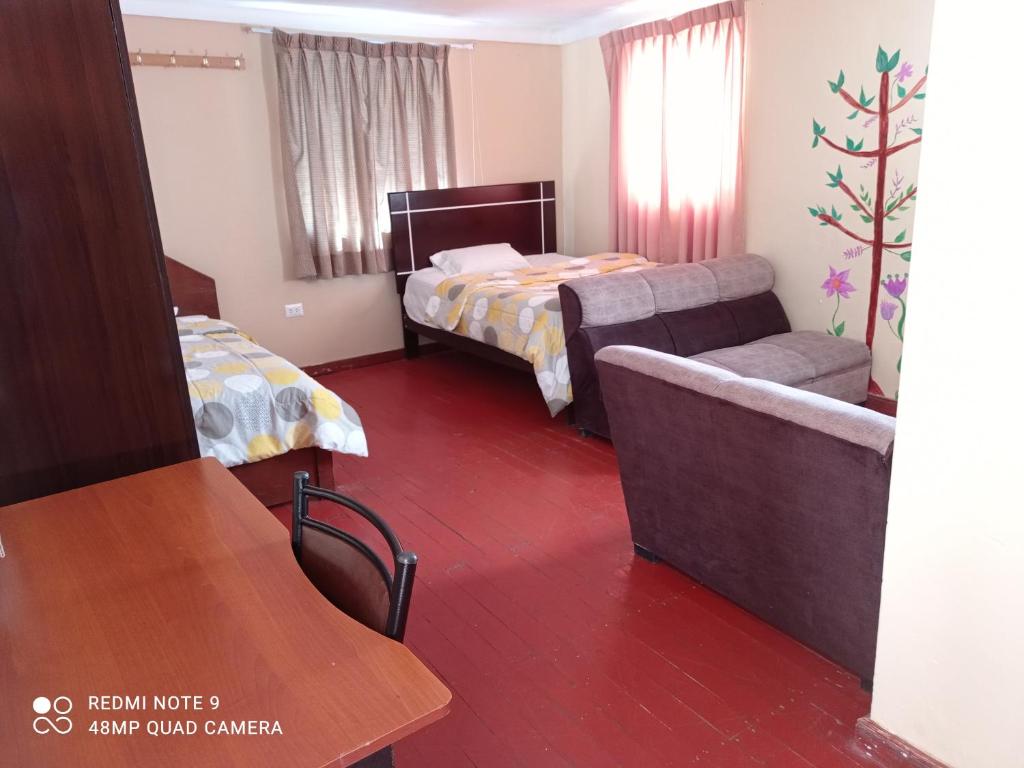 Voodi või voodid majutusasutuse Nature Home Cusco toas
