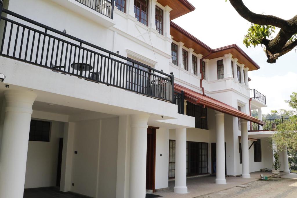 Balkón nebo terasa v ubytování King Of Kandy