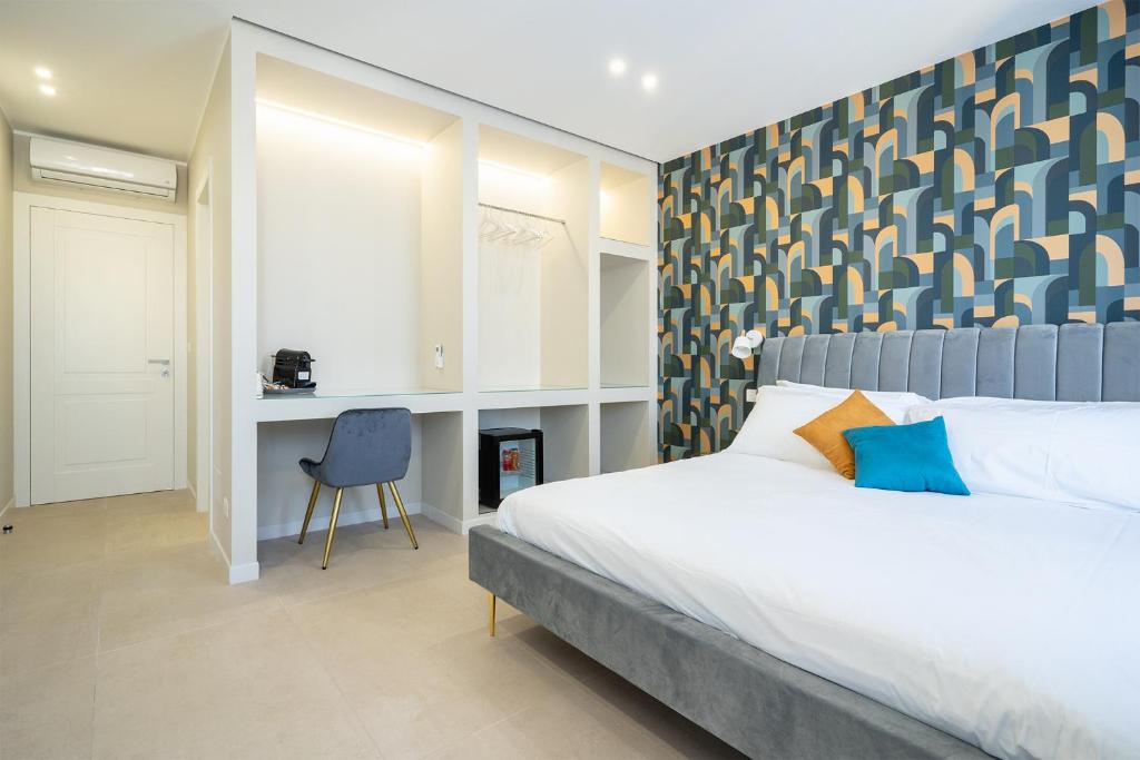 Postel nebo postele na pokoji v ubytování Il Pumo - Apulian Rooms Bari Calefati