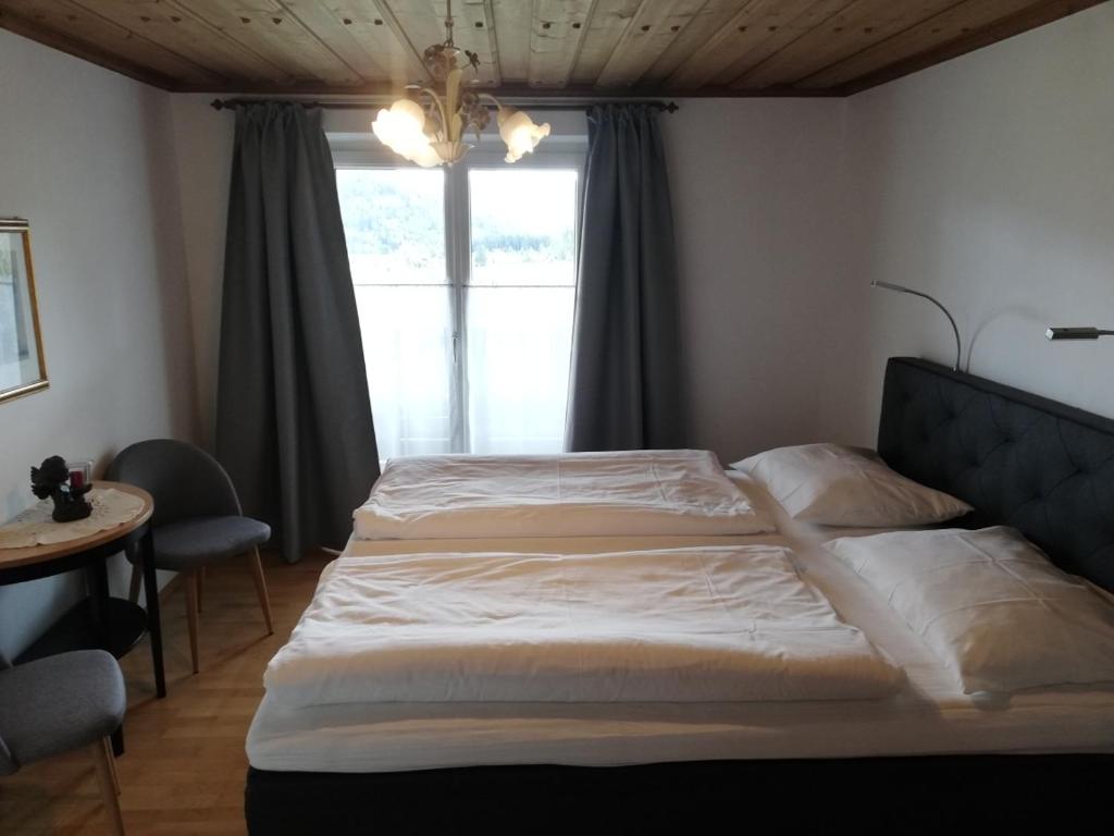 Postel nebo postele na pokoji v ubytování Appartements Ferienwohnungen Alpenblick