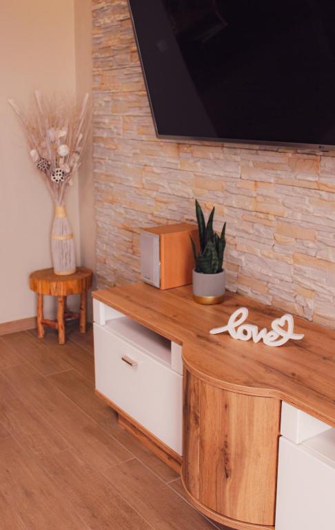 Televízia a/alebo spoločenská miestnosť v ubytovaní Villa Valf