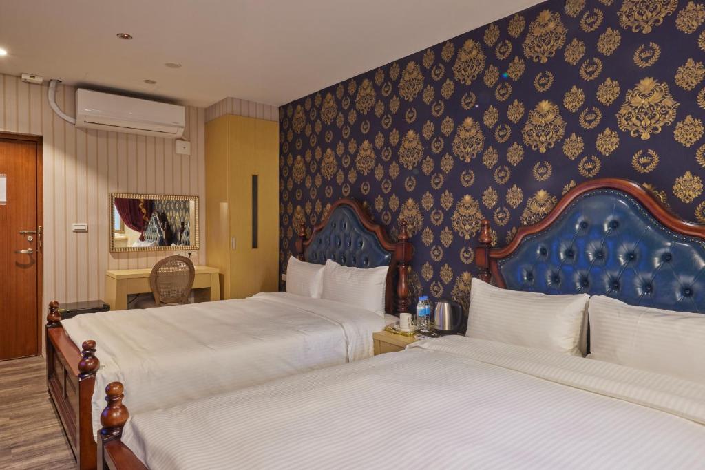 Postel nebo postele na pokoji v ubytování Kyokusui Hotspring Hotel
