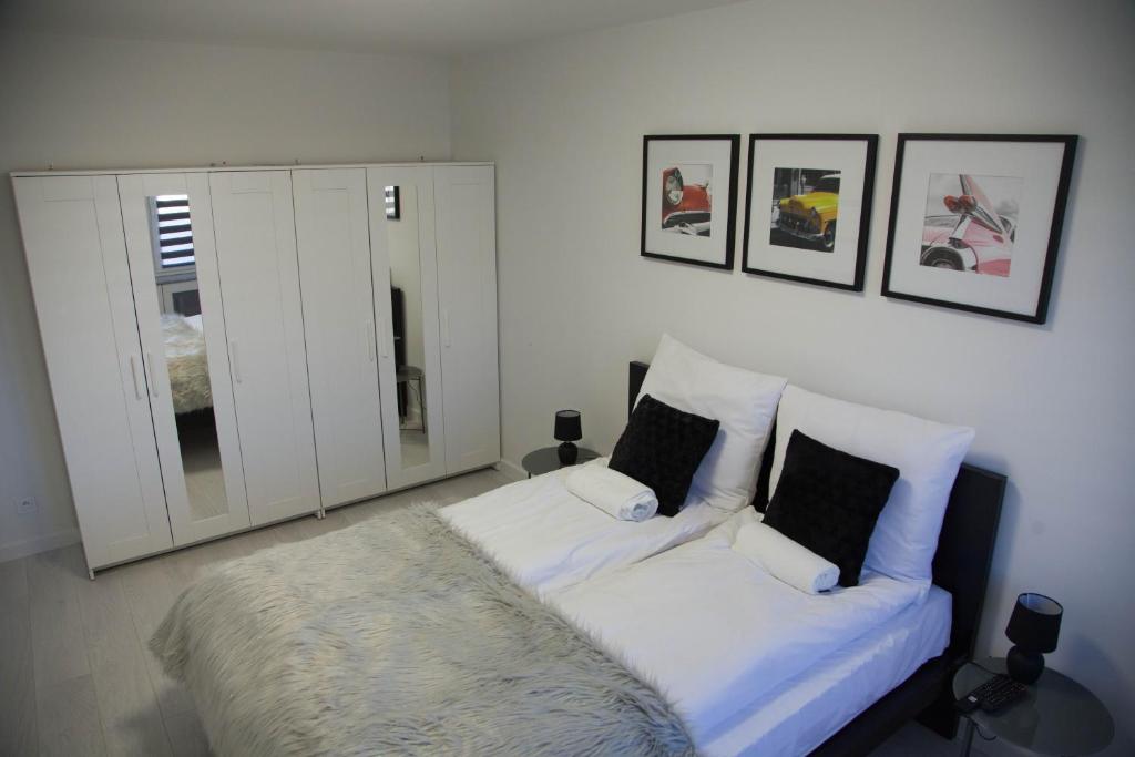 Posteľ alebo postele v izbe v ubytovaní Apartament Wrocław Borowska