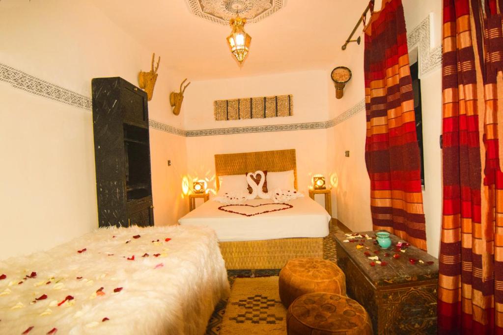 Postel nebo postele na pokoji v ubytování Riad Vis Ta Vie