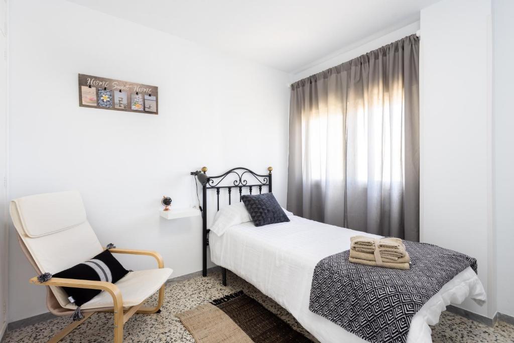 Postel nebo postele na pokoji v ubytování Home2Book Serene Apartment Ocean Breeze, Bajamar