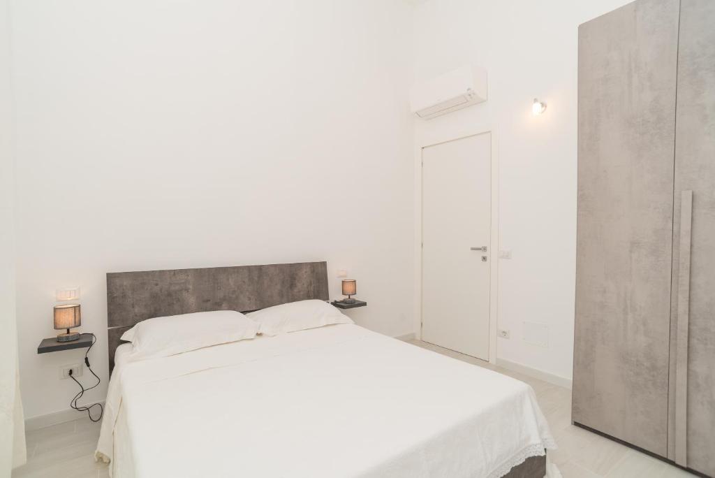 A bed or beds in a room at Villa Marisa