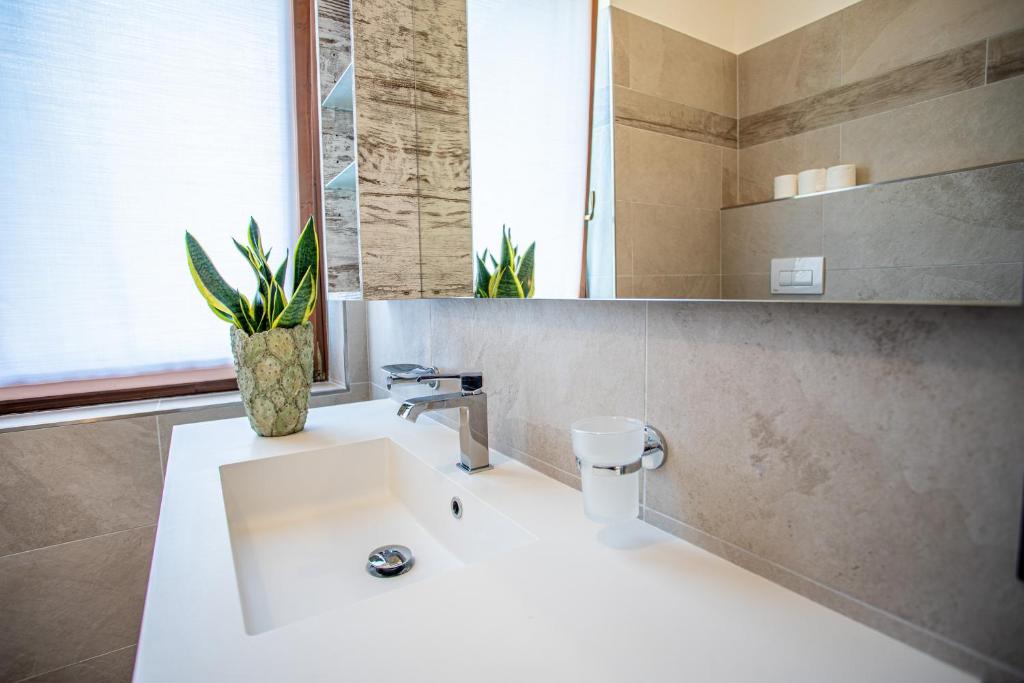 A bathroom at Hotel Residence La Pertica