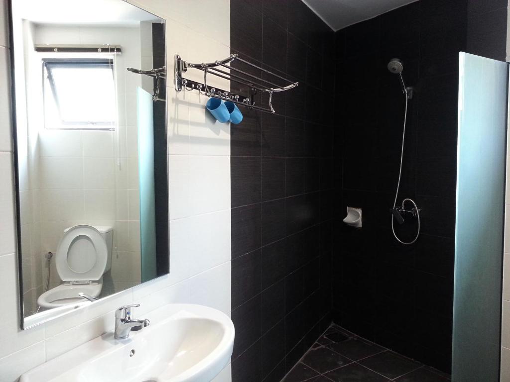 Koupelna v ubytování Padungan Hotel