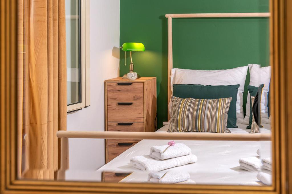 Posteľ alebo postele v izbe v ubytovaní Riverside City Villa Corfu