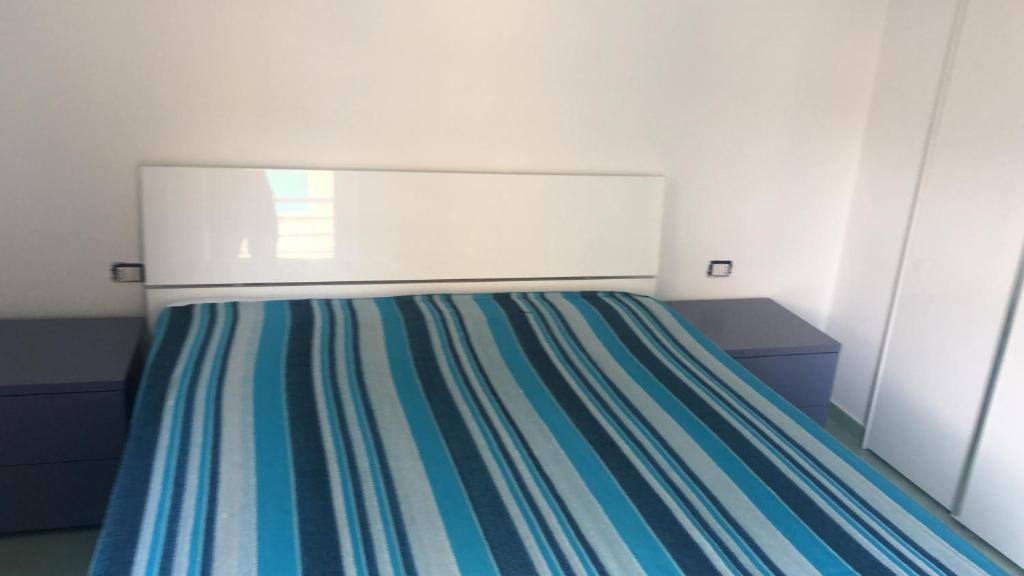 Postel nebo postele na pokoji v ubytování Scauri Inn